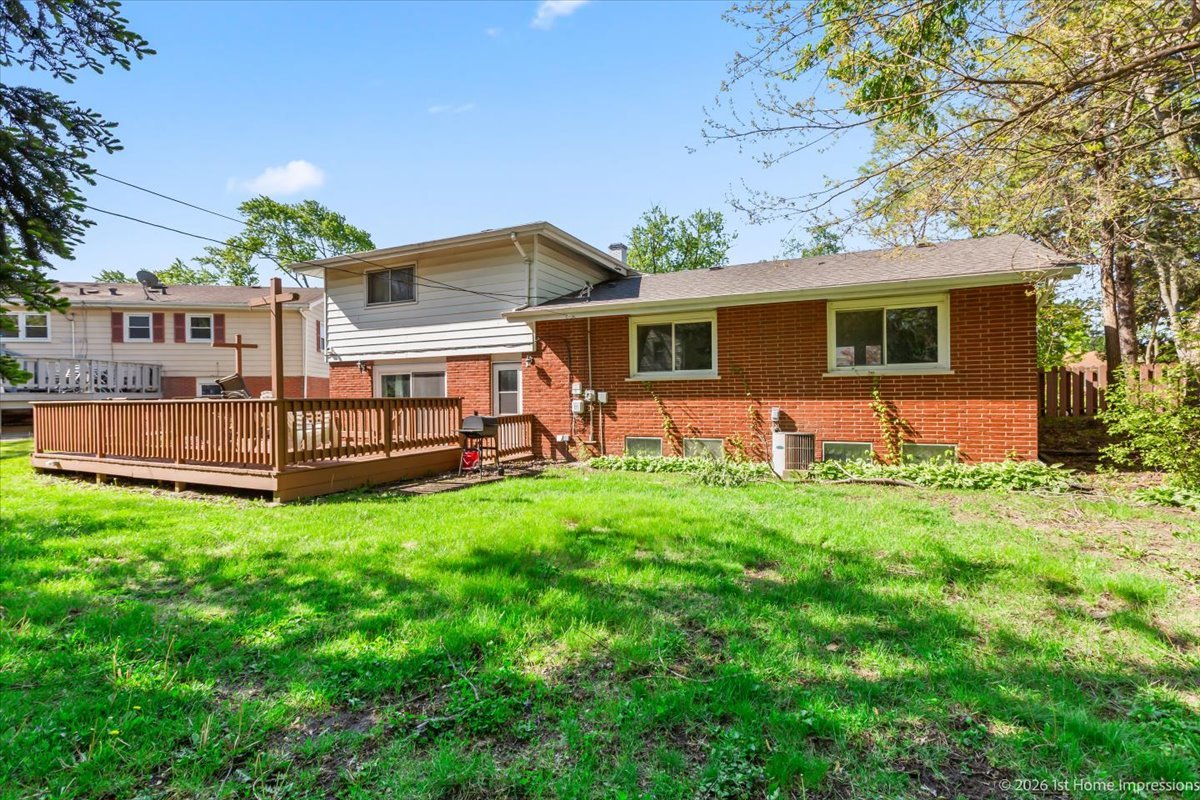 18847 May Avenue Homewood, IL 60430 - Photo 26 of 26 a view of a house with backyard and a tree