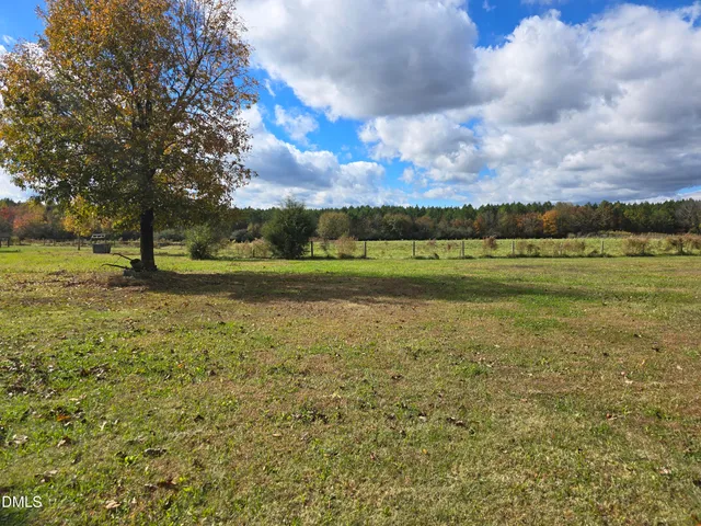 a view of a lake from a yard