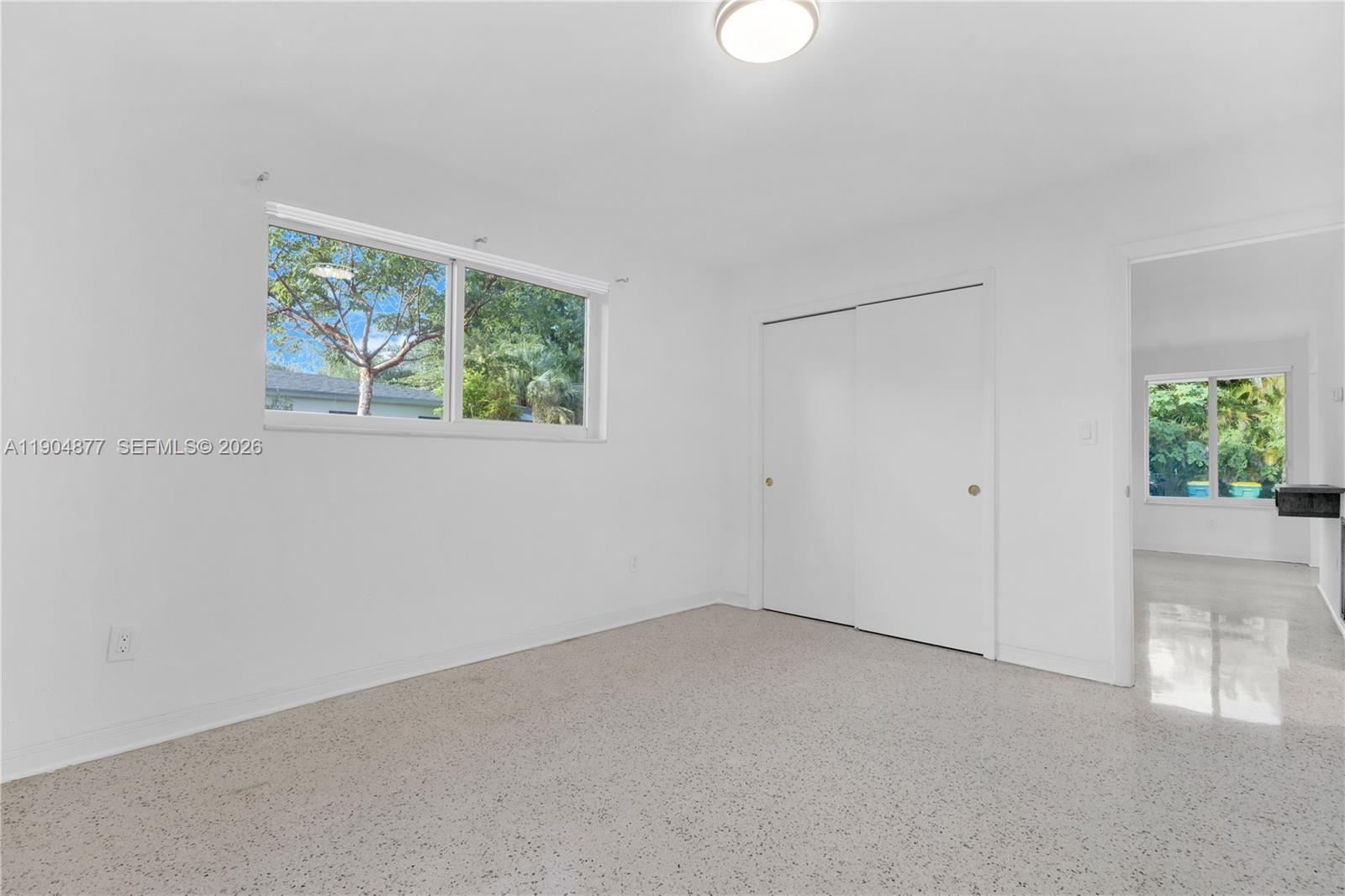 2931 Southwest 39th Avenue Miami, FL 33134 - Photo 14 of 27 an empty room with windows