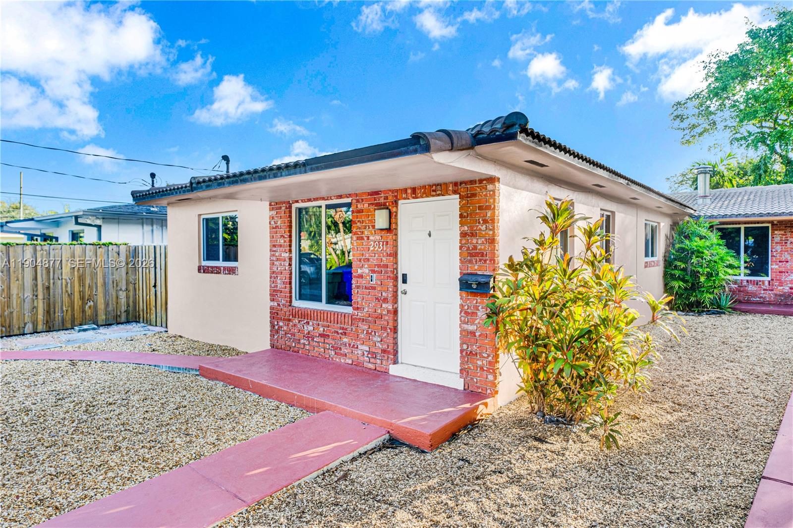 2931 Southwest 39th Avenue Miami, FL 33134 - Photo 22 of 27 a front view of a house with garden