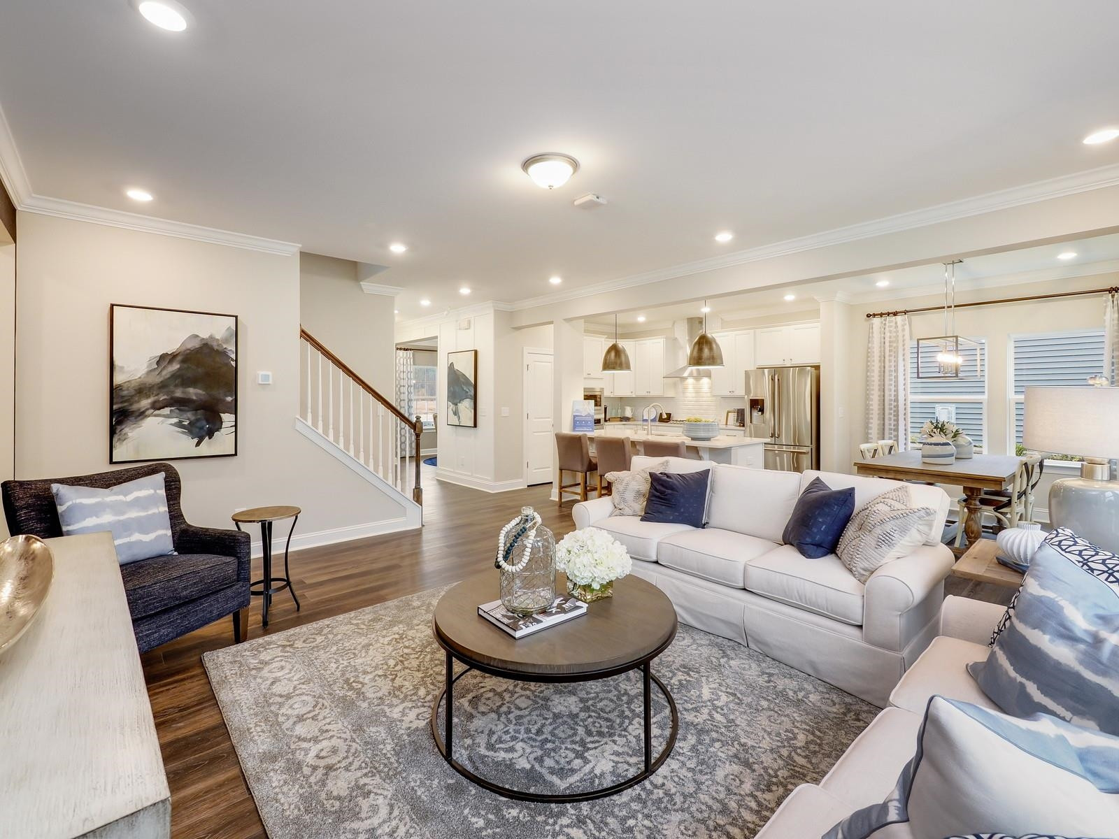 112 Keyshore Bend, Unit 163 Raleigh, NC 27610 - Photo 11 of 32 a living room with furniture and a view of kitchen