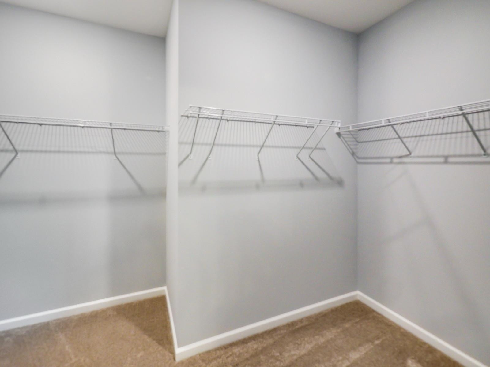 112 Keyshore Bend, Unit 163 Raleigh, NC 27610 - Photo 20 of 32 a view of a room with racks on the wall