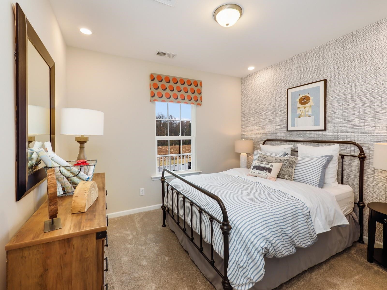 112 Keyshore Bend, Unit 163 Raleigh, NC 27610 - Photo 25 of 32 a bedroom with a bed and a dresser