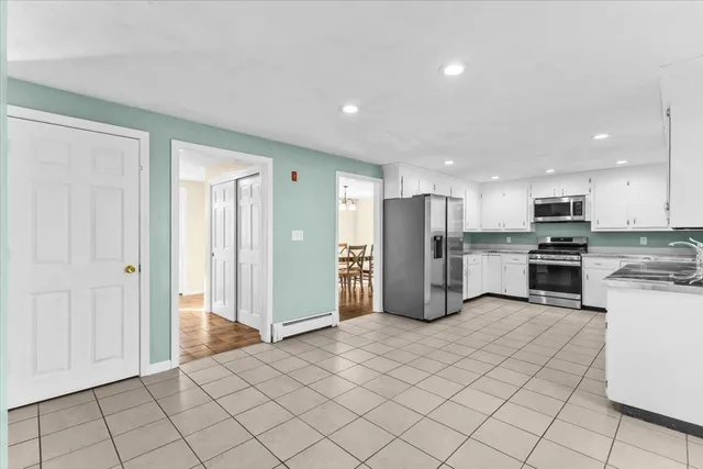 a bed room with a bed and a window