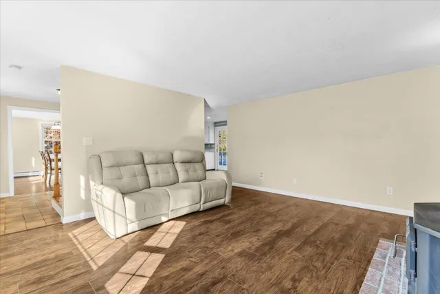 a bathroom with a sink vanity and toilet