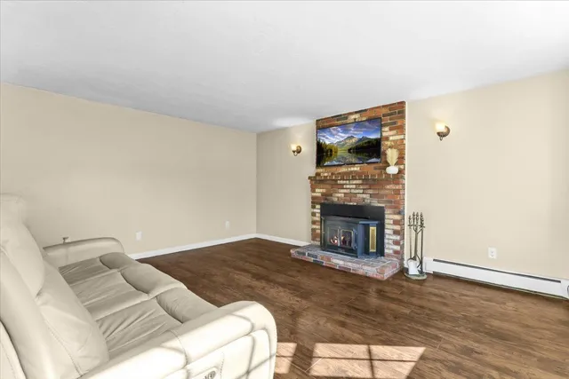 a view of a big room with staircase stairs and a way to ceiling window