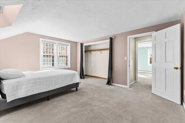 a view of a house with wooden deck