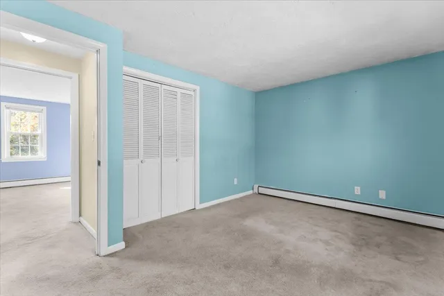 a view of backyard with a patio