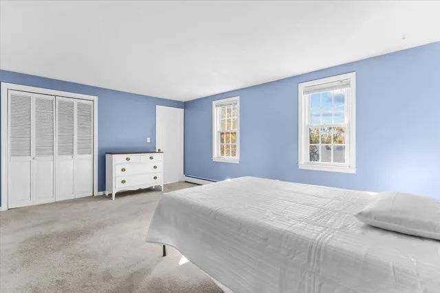 a view of livingroom with furniture and windows