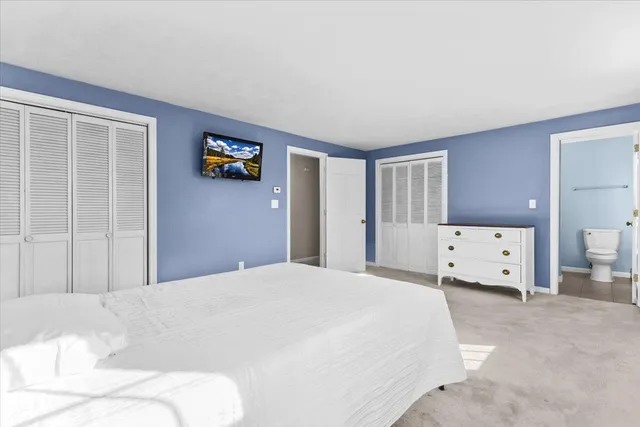 a view of a patio with a table and chairs