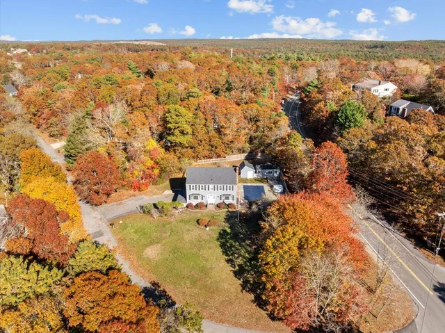 an aerial view of residential building with parking space