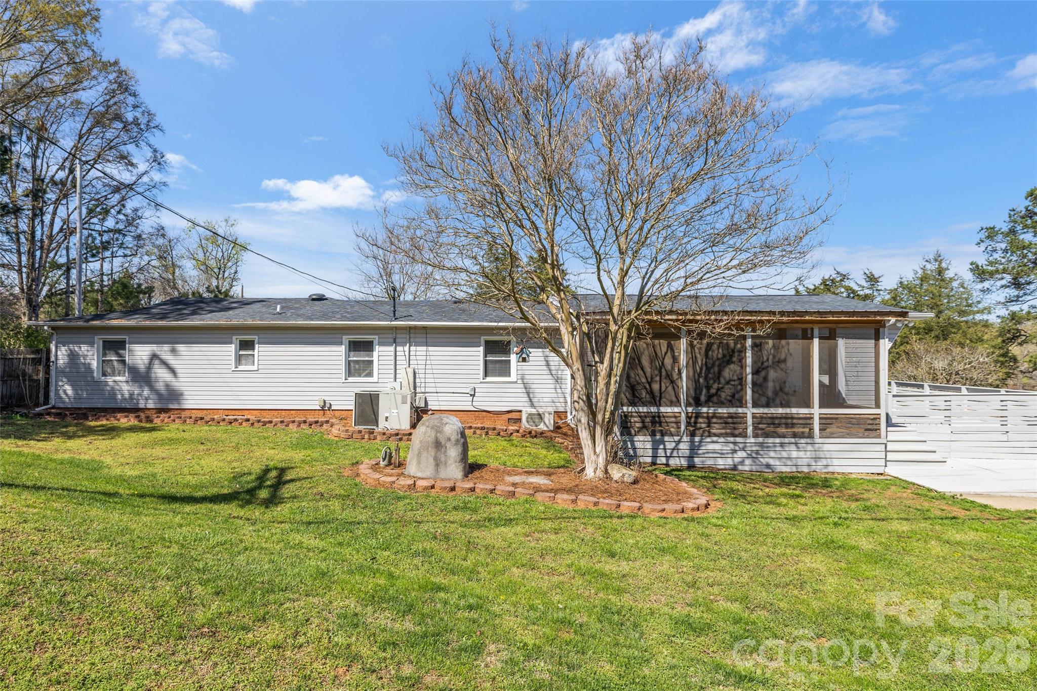 4790 Polk Ford Road Stanfield, NC 28163 - Photo 28 of 45 a view of a house with backyard and sitting area