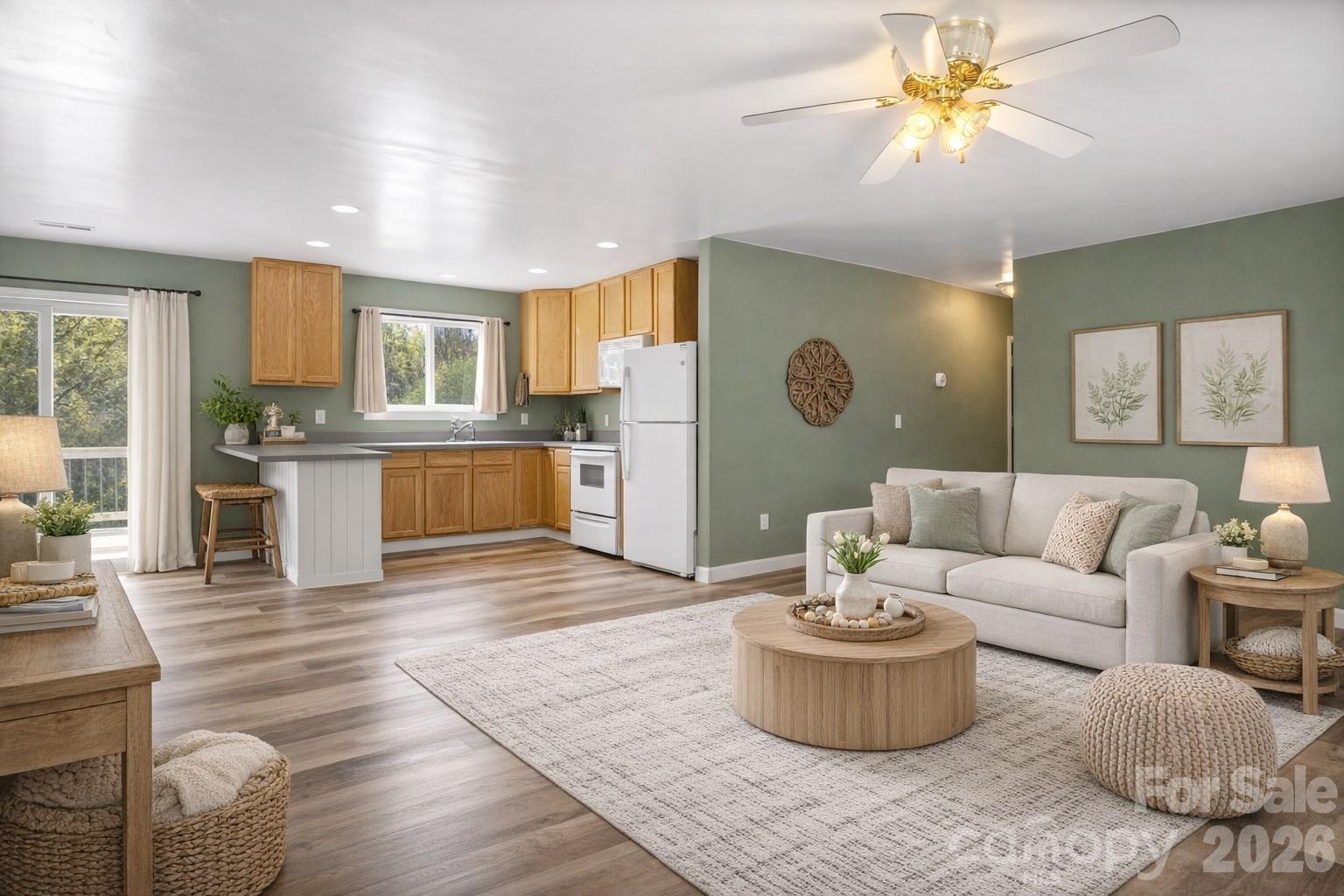 4790 Polk Ford Road Stanfield, NC 28163 - Photo 33 of 45 a living room with furniture and a fireplace