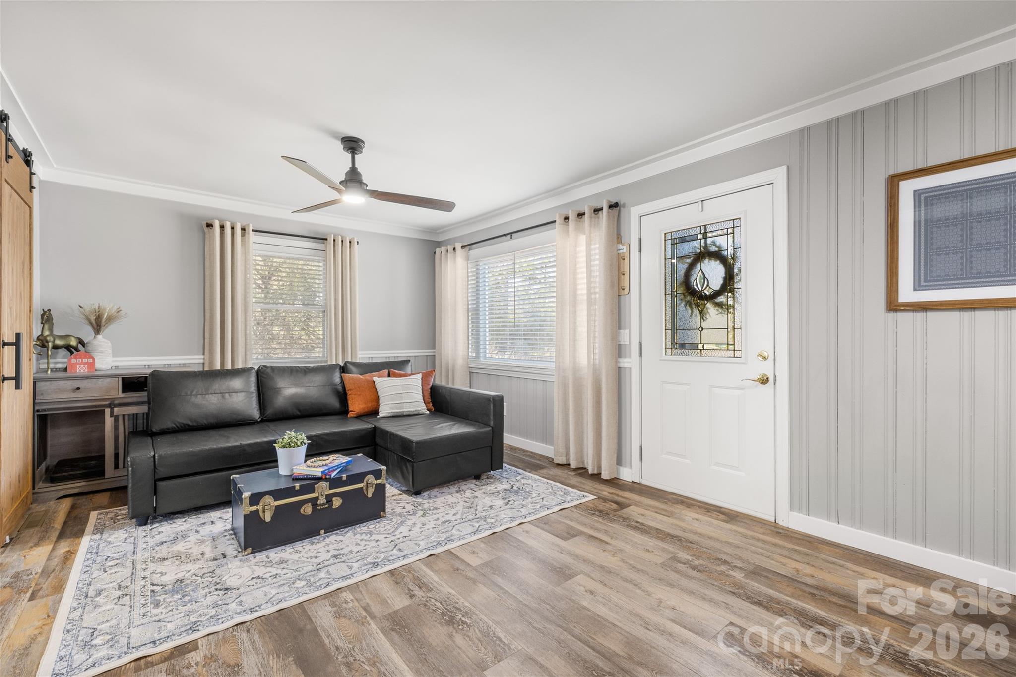 4790 Polk Ford Road Stanfield, NC 28163 - Photo 6 of 45 a living room with furniture and a window