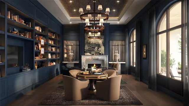 a dining room with chandelier and wooden floor