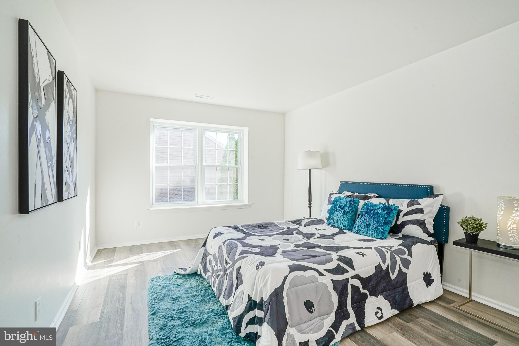 1104 B Ralston Drive Mount Laurel, NJ 08054 - Photo 14 of 24 a bedroom with a bed and a window