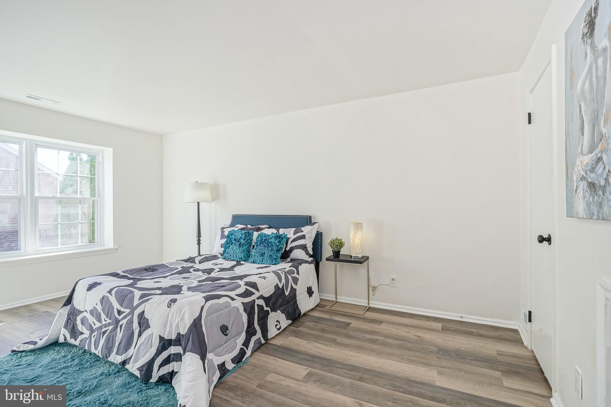 1104 B Ralston Drive Mount Laurel, NJ 08054 - Photo 16 of 24 a bedroom with a bed and a window