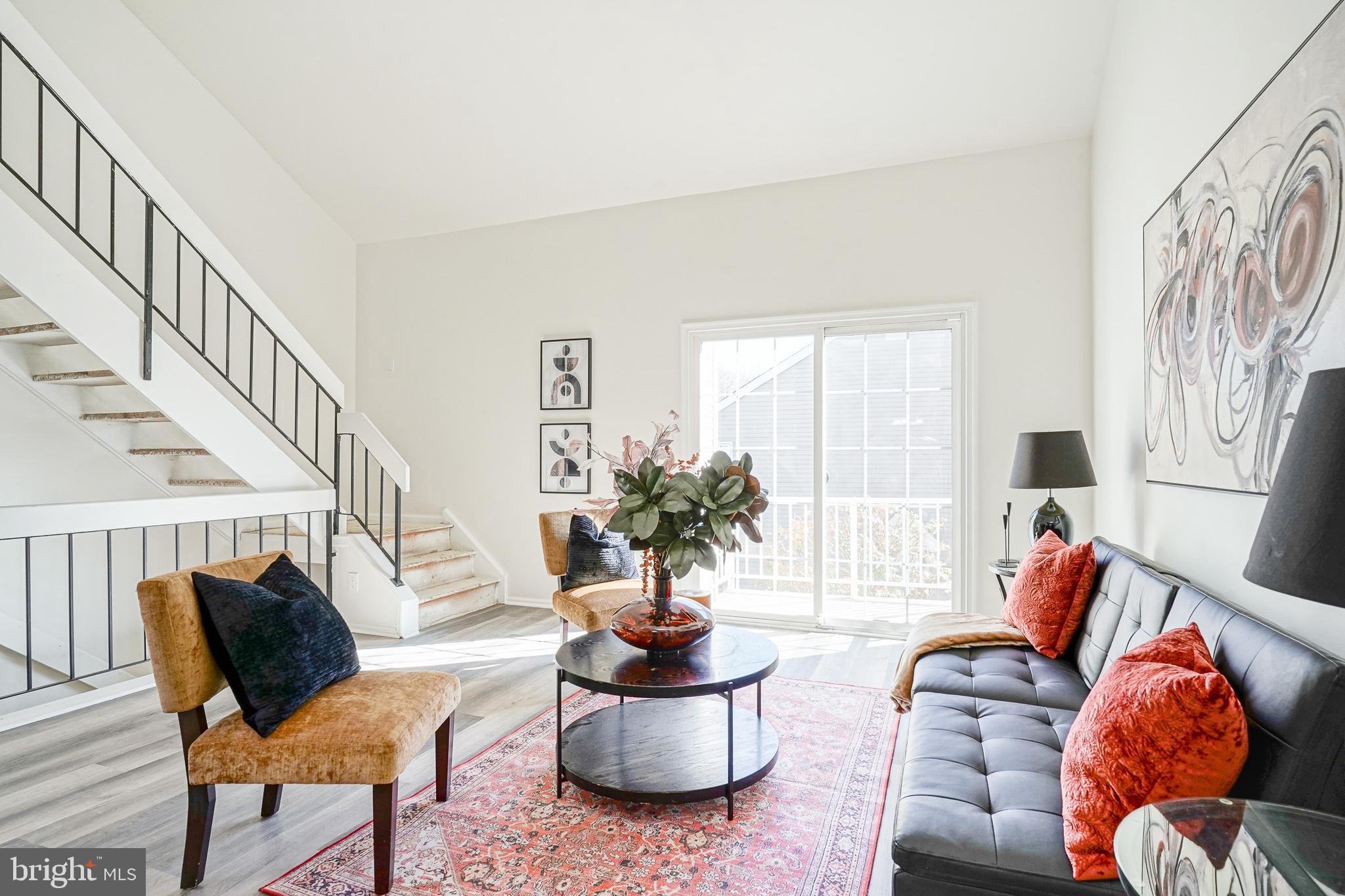 1104 B Ralston Drive Mount Laurel, NJ 08054 - Photo 2 of 24 a living room with furniture and a potted plant