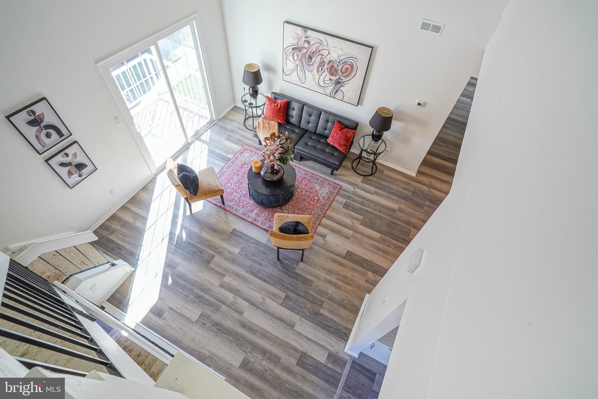 1104 B Ralston Drive Mount Laurel, NJ 08054 - Photo 6 of 24 a living room with furniture and a flat screen tv