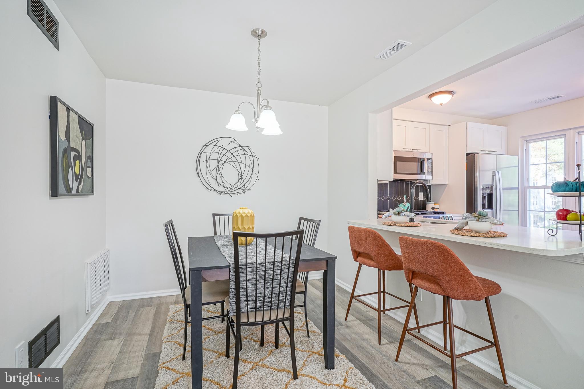 1104 B Ralston Drive Mount Laurel, NJ 08054 - Photo 7 of 24 a dining room that has a table and chairs in it