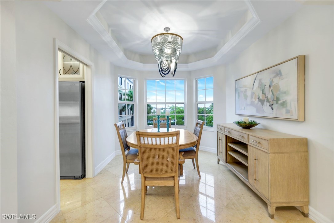 401 Bayfront Place, Unit 3301 Naples, FL 34102 - Photo 14 of 30 a view of a dining room with furniture window and outside view