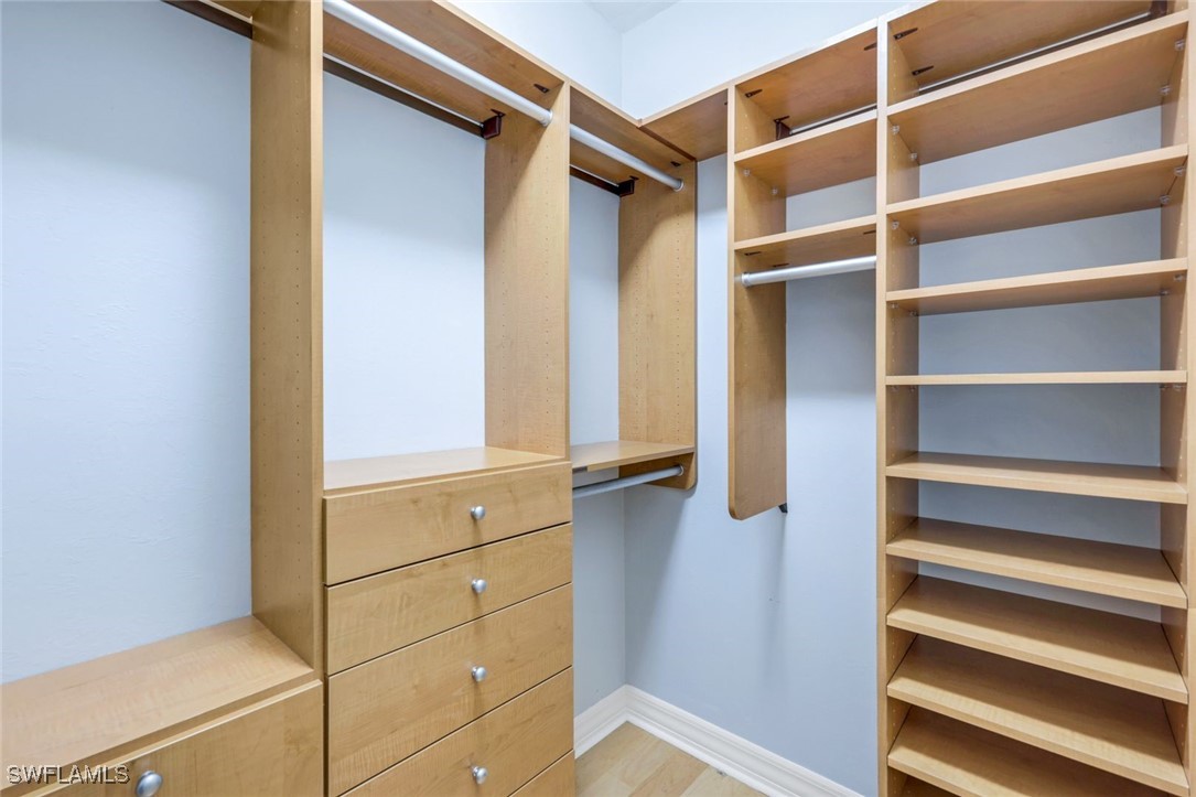 401 Bayfront Place, Unit 3301 Naples, FL 34102 - Photo 17 of 30 a view of walk in closet with empty racks