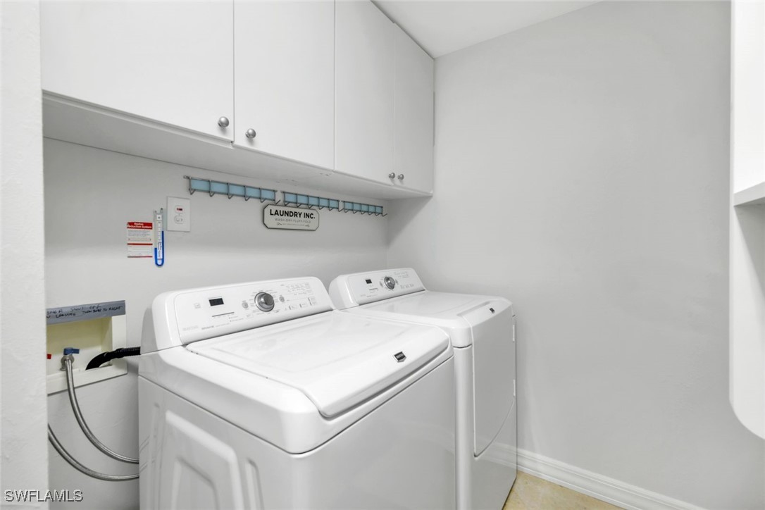 401 Bayfront Place, Unit 3301 Naples, FL 34102 - Photo 23 of 30 a utility room with dryer and washer