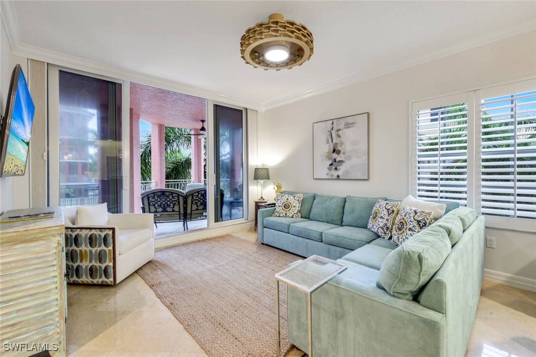 401 Bayfront Place, Unit 3301 Naples, FL 34102 - Photo 3 of 30 a living room with furniture and a large window