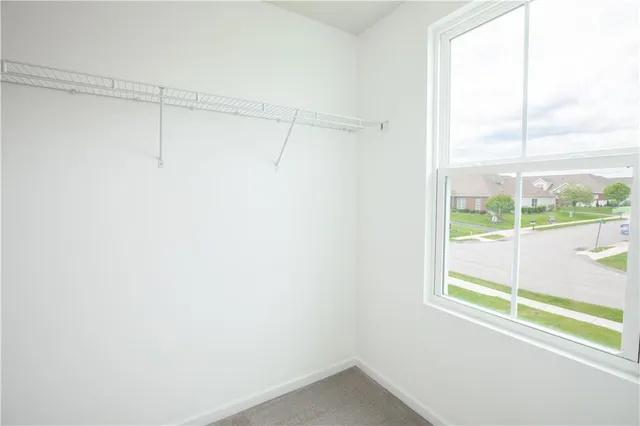a view of a room that has a window