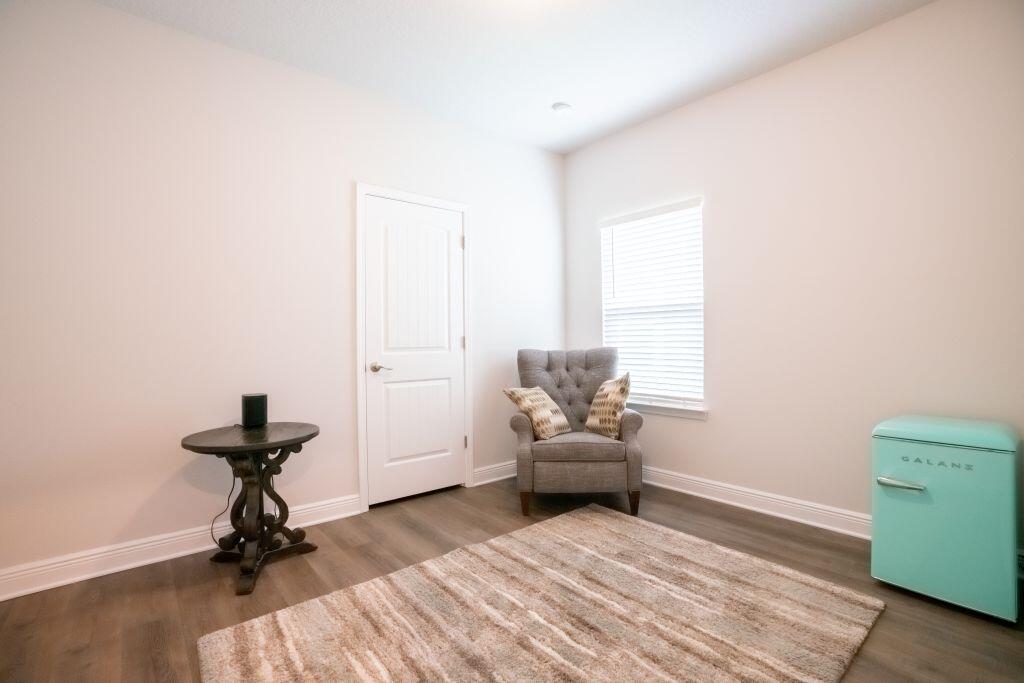 113 Cool Breeze Drive Freeport, FL 32439 - Photo 14 of 16 a living room with furniture and a rug