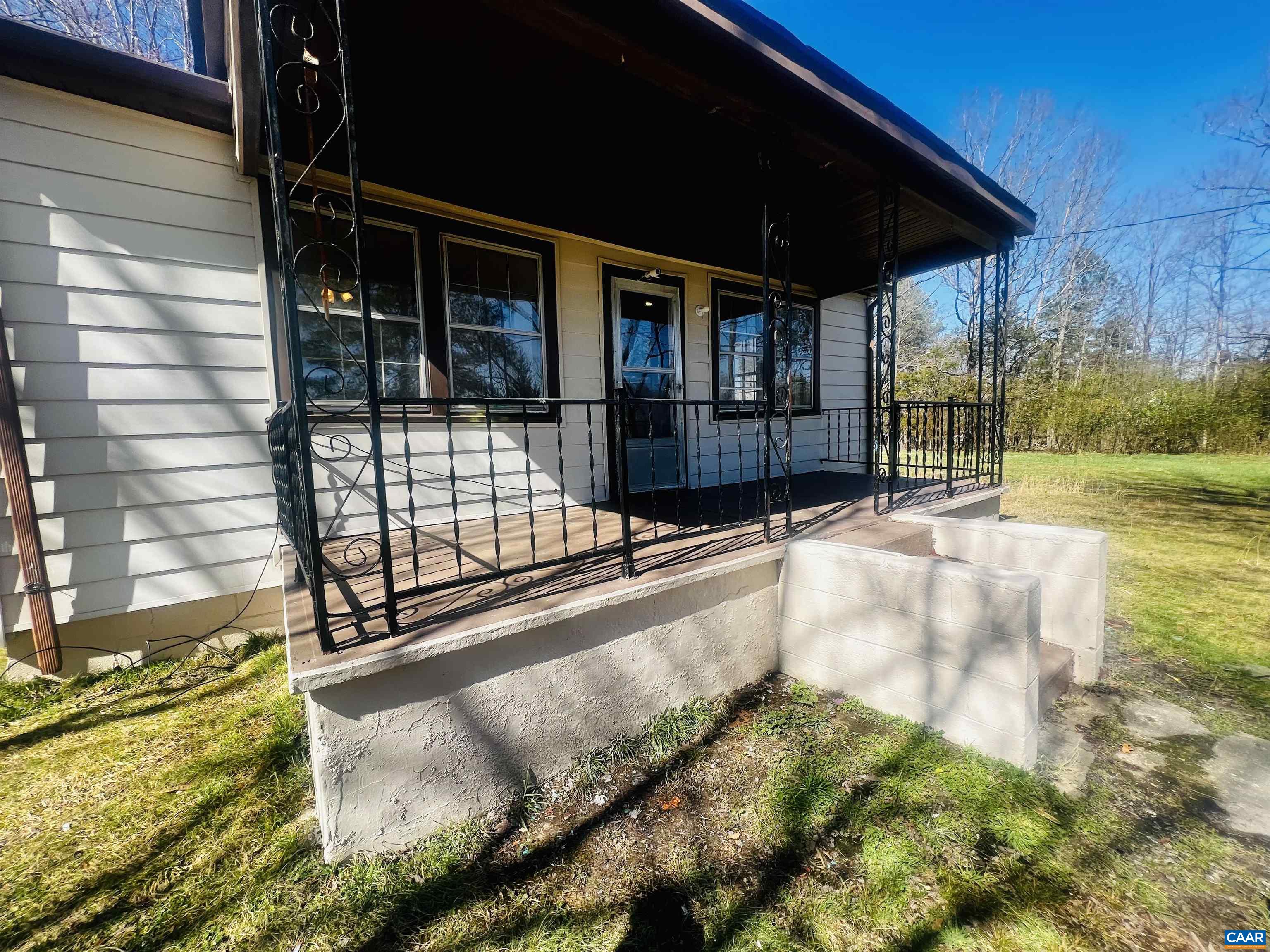 2753 Ridge Road Arvonia, VA 23004 - Photo 2 of 16 a view of backyard with porch
