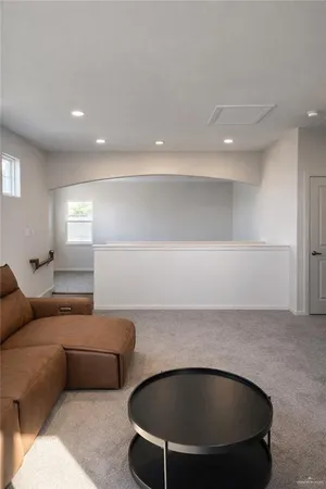 a living room with furniture and a couch