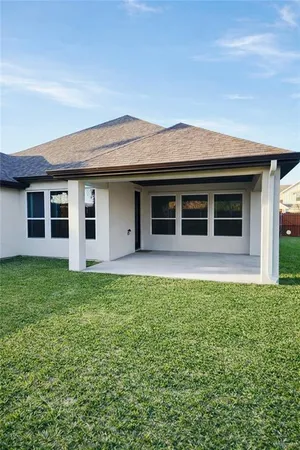a house view with a garden space