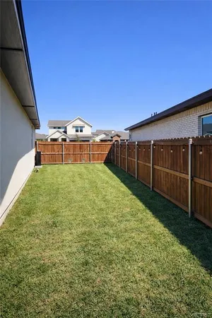 a view of a garden with a chair
