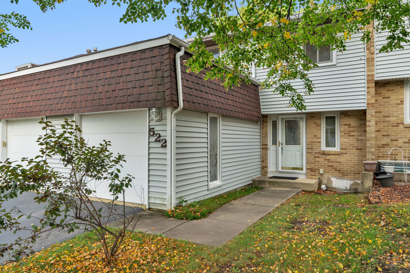 522 Julie Road Bolingbrook, IL 60440 - Photo 1 of 28 a front view of a house with garden
