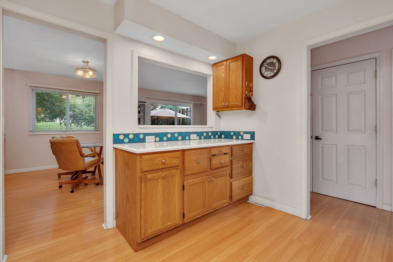 522 Julie Road Bolingbrook, IL 60440 - Photo 11 of 28 a spacious bathroom with a granite countertop sink and a mirror
