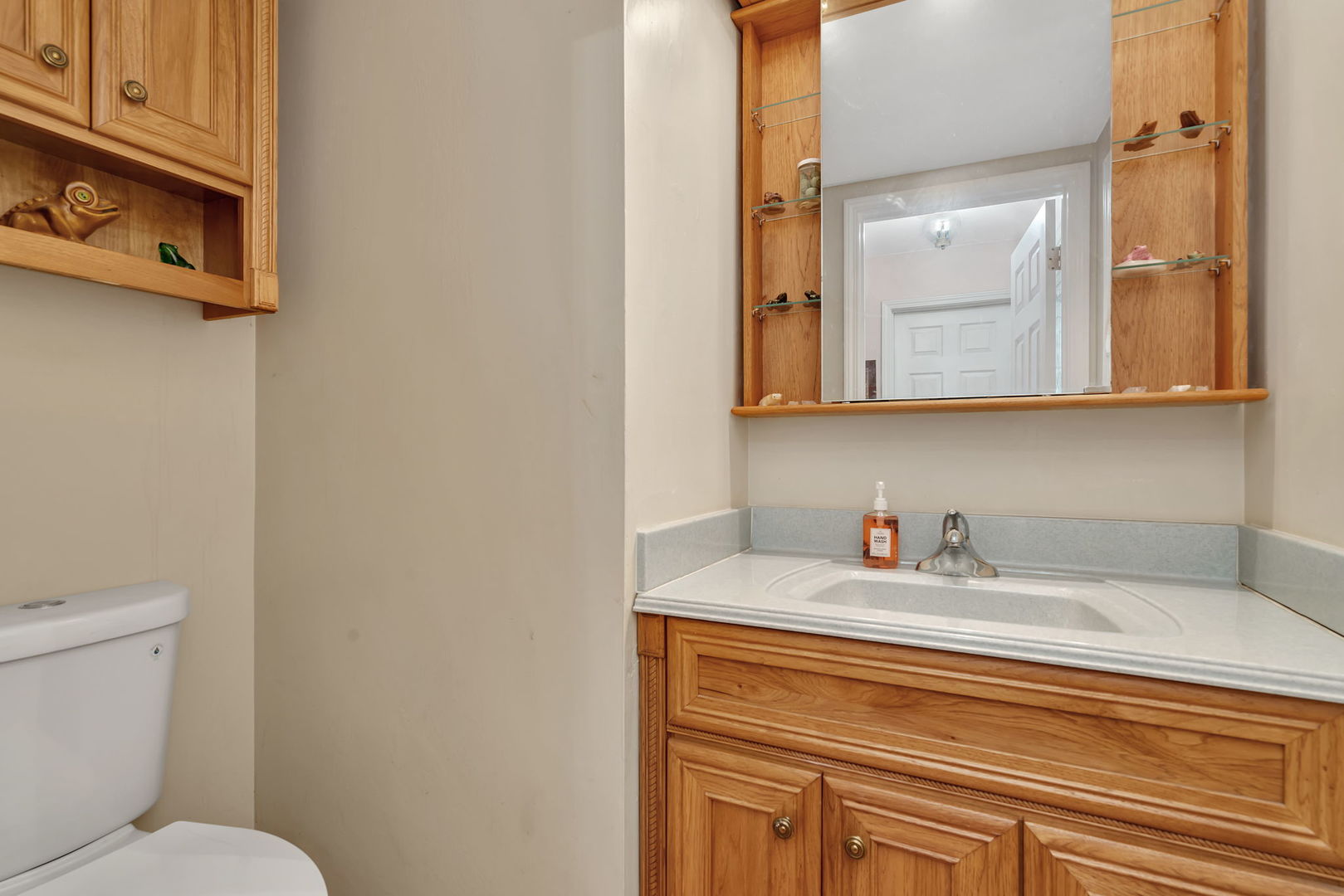 522 Julie Road Bolingbrook, IL 60440 - Photo 12 of 28 a bathroom with a sink and a toilet