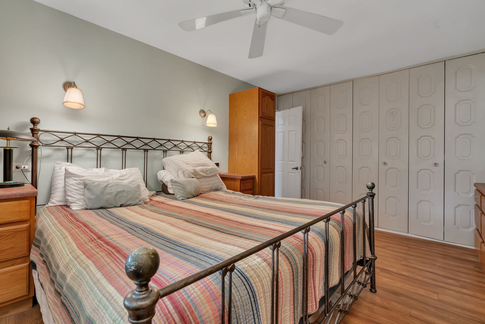 522 Julie Road Bolingbrook, IL 60440 - Photo 14 of 28 a bedroom with a bed and wooden floor