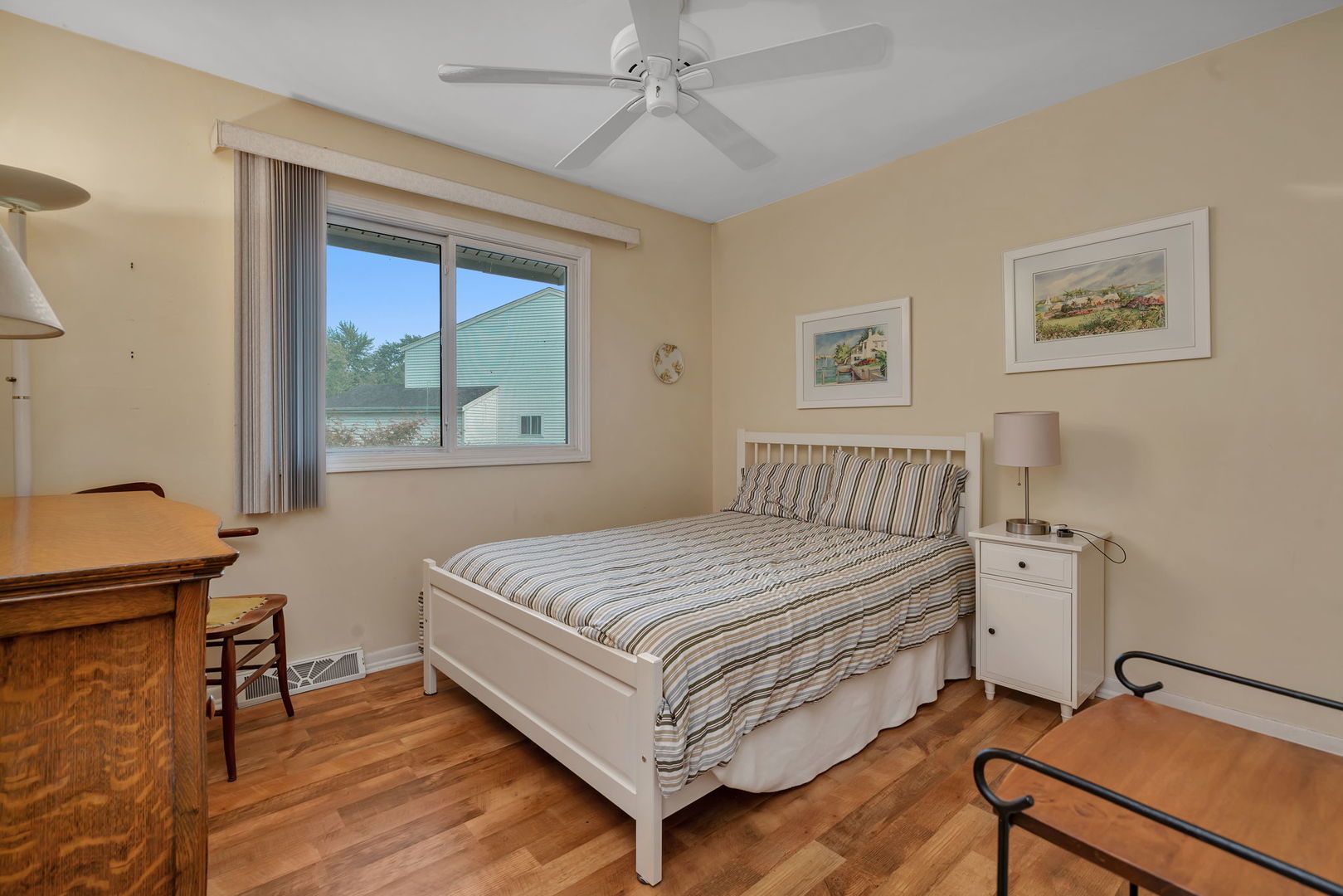 522 Julie Road Bolingbrook, IL 60440 - Photo 15 of 28 a bedroom with a bed and a window