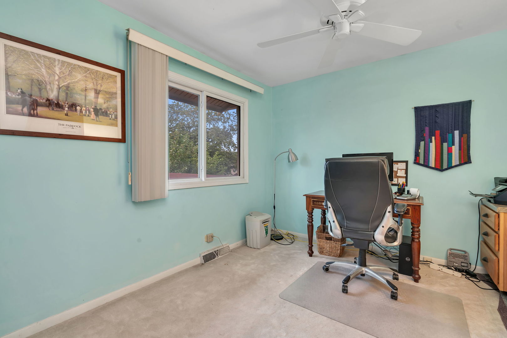 522 Julie Road Bolingbrook, IL 60440 - Photo 17 of 28 a view of a workspace with furniture and a window