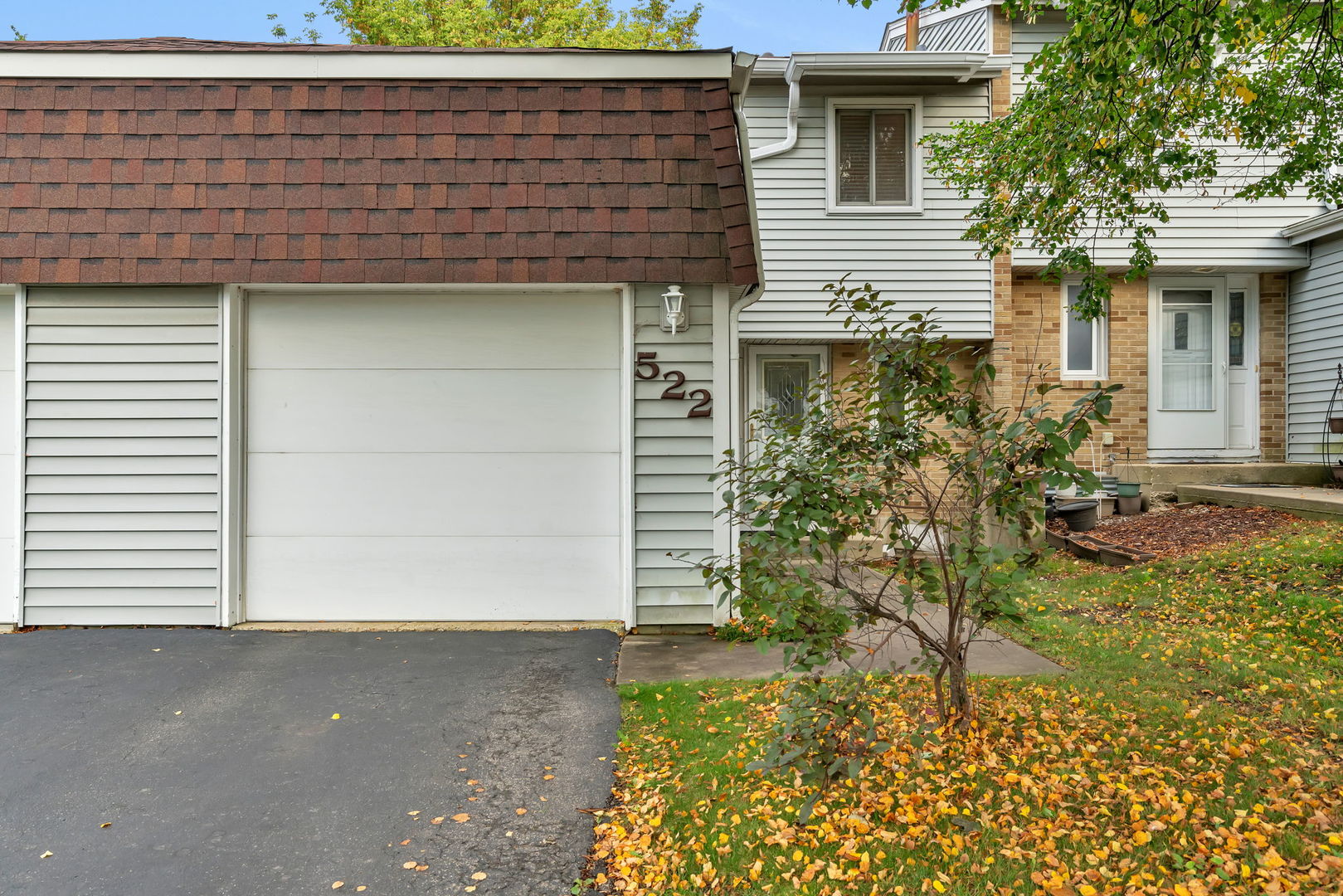 522 Julie Road Bolingbrook, IL 60440 - Photo 2 of 28 a front view of a house with a yard