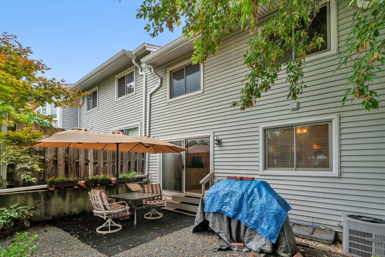 522 Julie Road Bolingbrook, IL 60440 - Photo 24 of 28 a backyard of a house with seating space