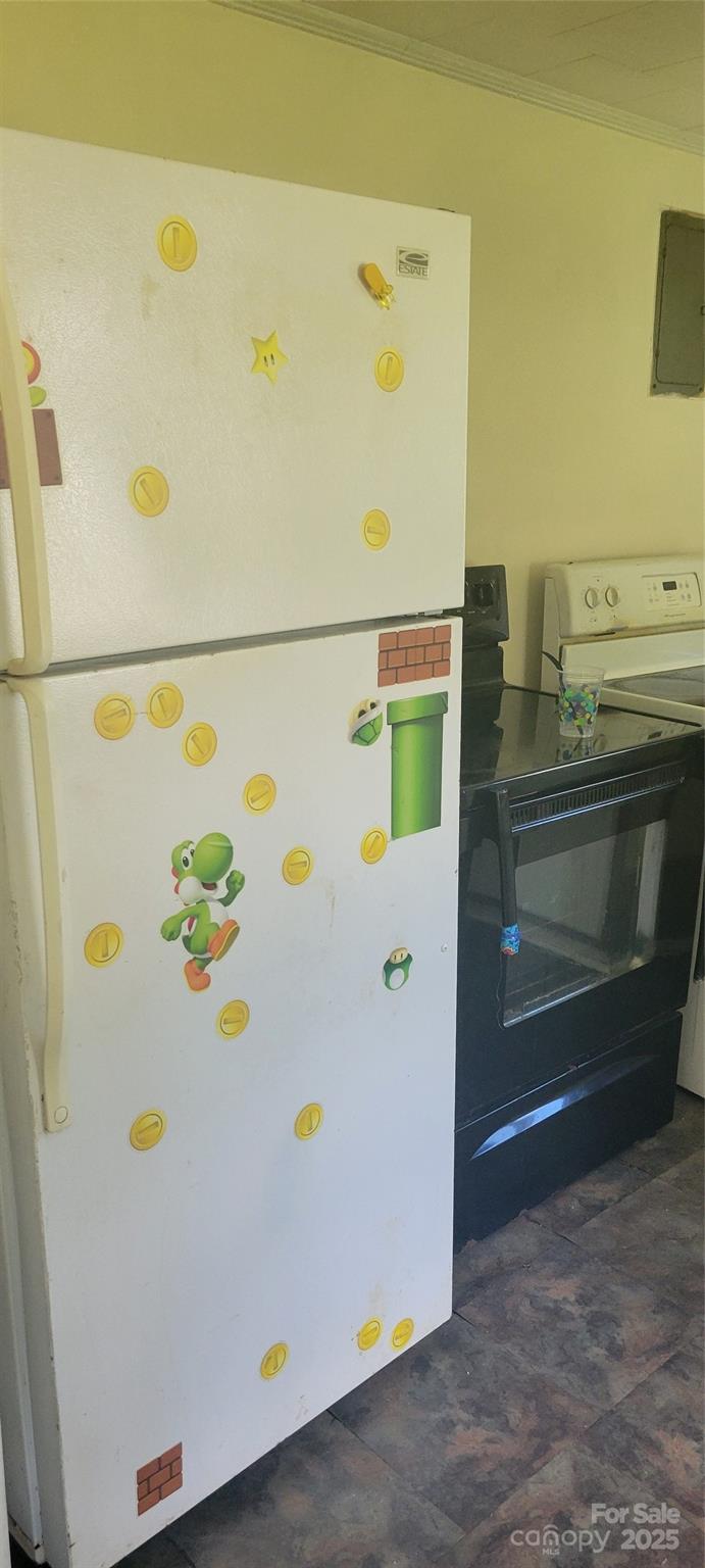 335 Rosenwald School Street Catawba, NC 28609 - Photo 6 of 13 a white refrigerator with a white wooden table