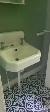 a view of a bathtub in a bathroom