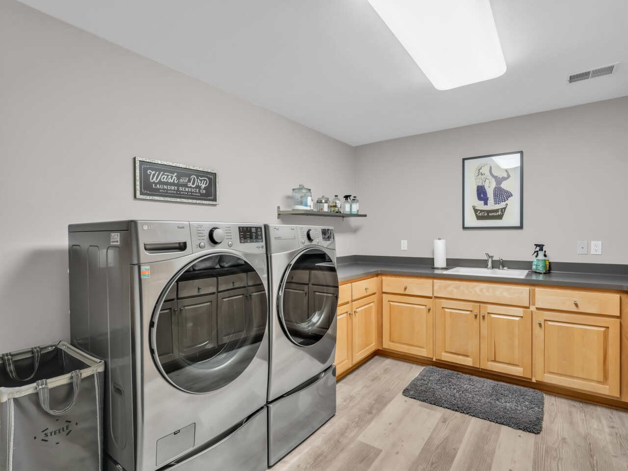 8 Lake Pointe Circle Wind Point, WI 53402 - Photo 22 of 32 Large laundry room