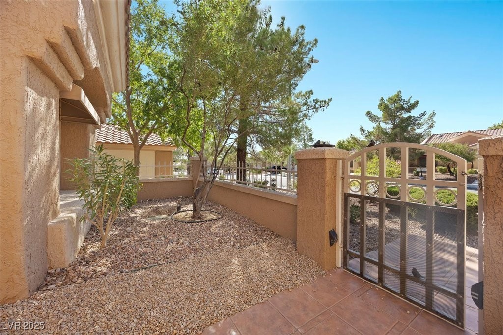 9352 Villa Ridge Drive Las Vegas, NV 89134 - Photo 8 of 33 Gated front courtyard