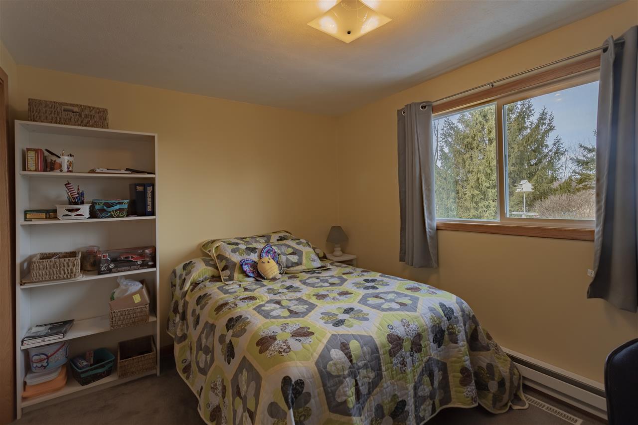 9119 Montague Road Winnebago, IL 61088 - Photo 21 of 36 a bedroom with a bed and a window