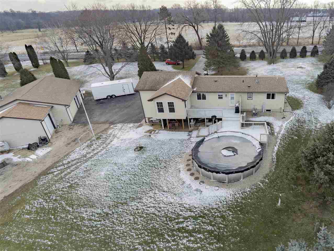 9119 Montague Road Winnebago, IL 61088 - Photo 29 of 36 an aerial view of a house with outdoor space