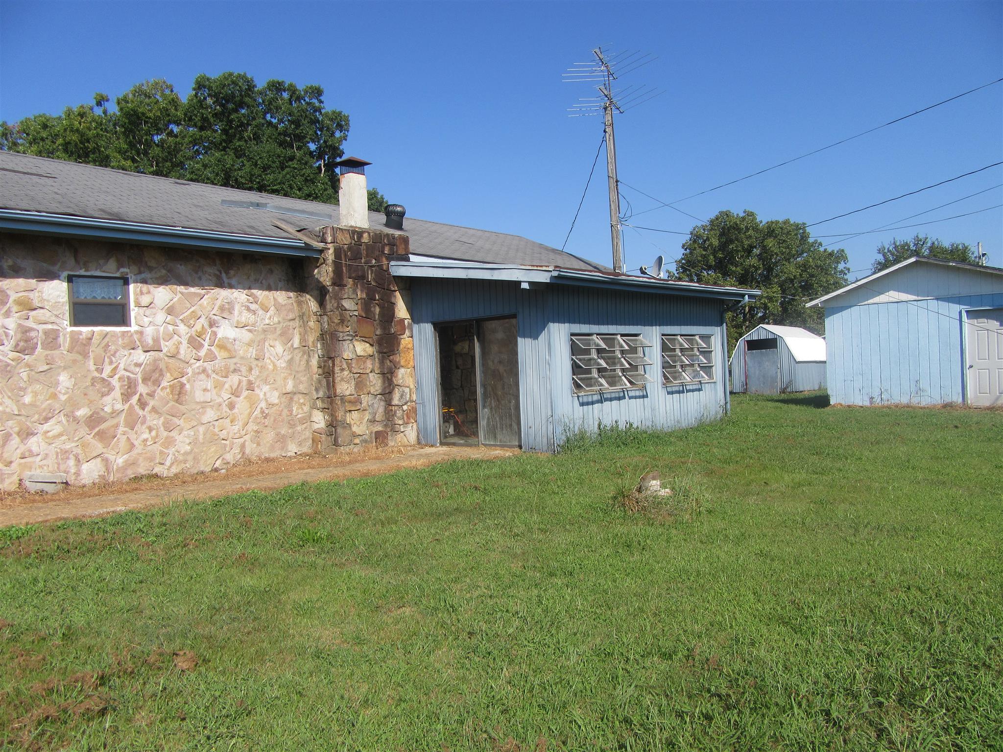 902 Trussell Road Monteagle, TN 37356 - Photo 2 of 23 Back of the house has storage building 1 and 2