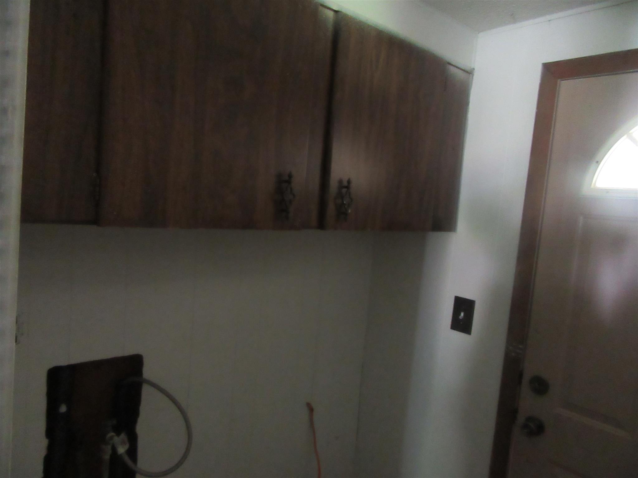 902 Trussell Road Monteagle, TN 37356 - Photo 14 of 23 Landry room leads into the floria room